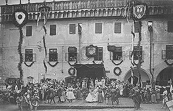 Festival in Česk Krumlov, dance on podium in front of town hall, historical photo